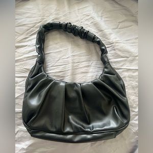Super trendy and stylish black shoulder purse for going out and casual outing.